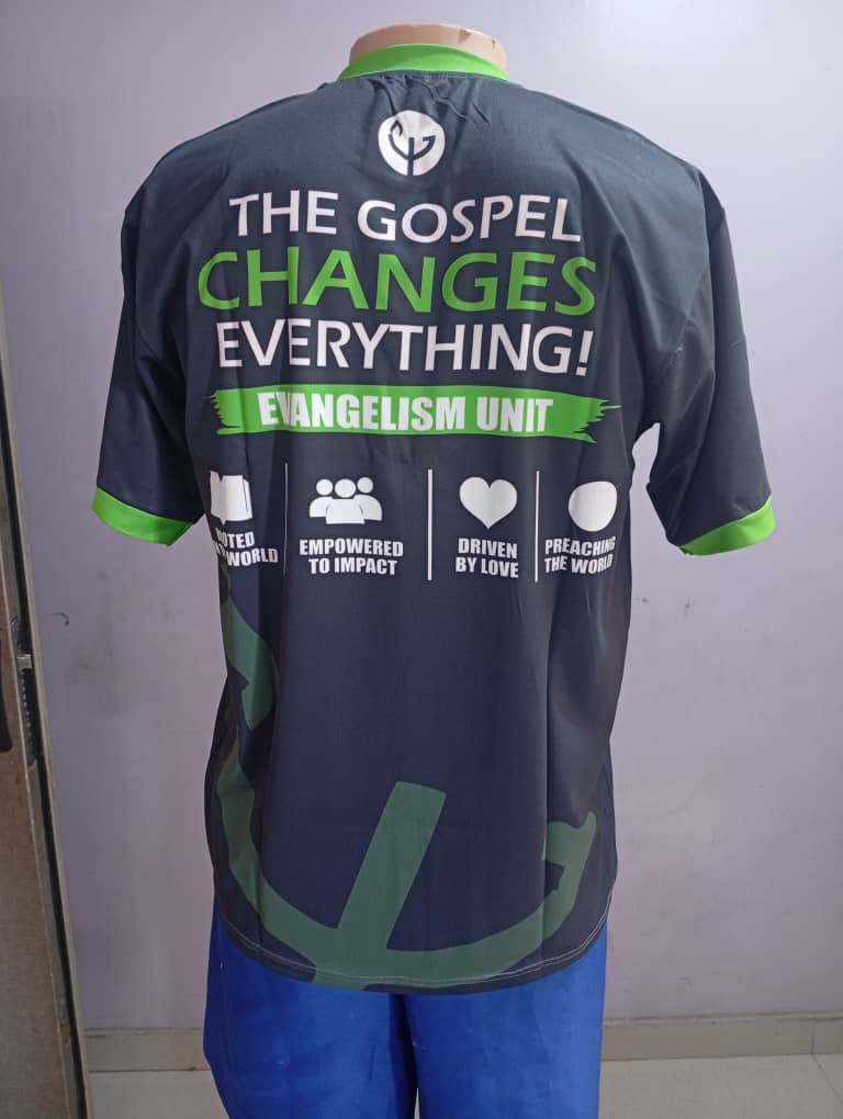 Green branded team jersey made by Sejeta, shown from the back