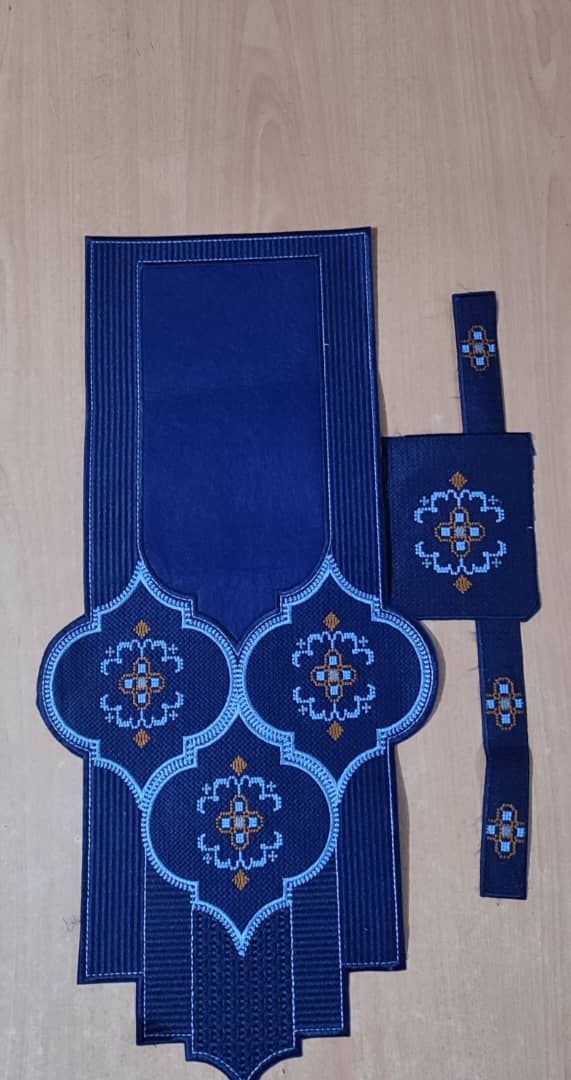 Navy embroidered panel and matching pieces with blue and gold motifs