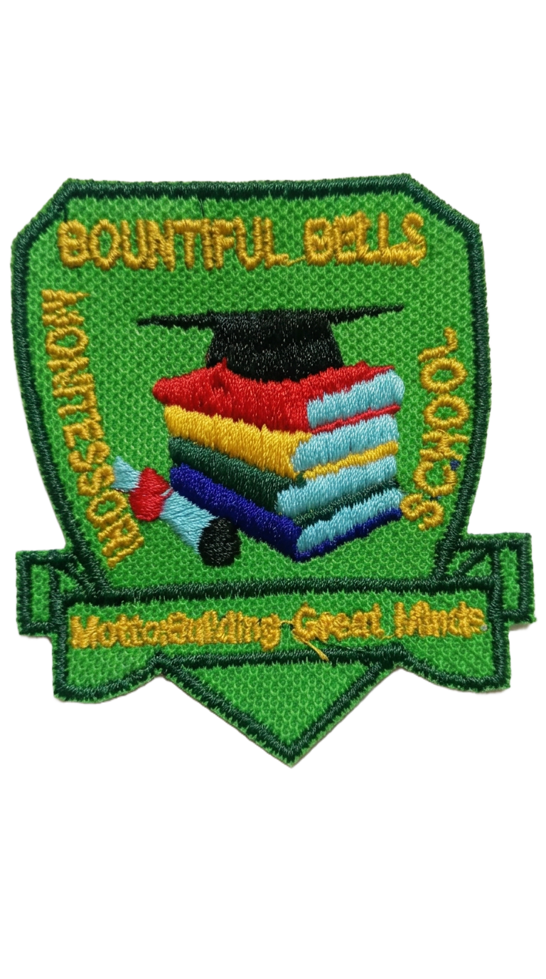 Colourful school crest embroidery featuring books and a graduation cap